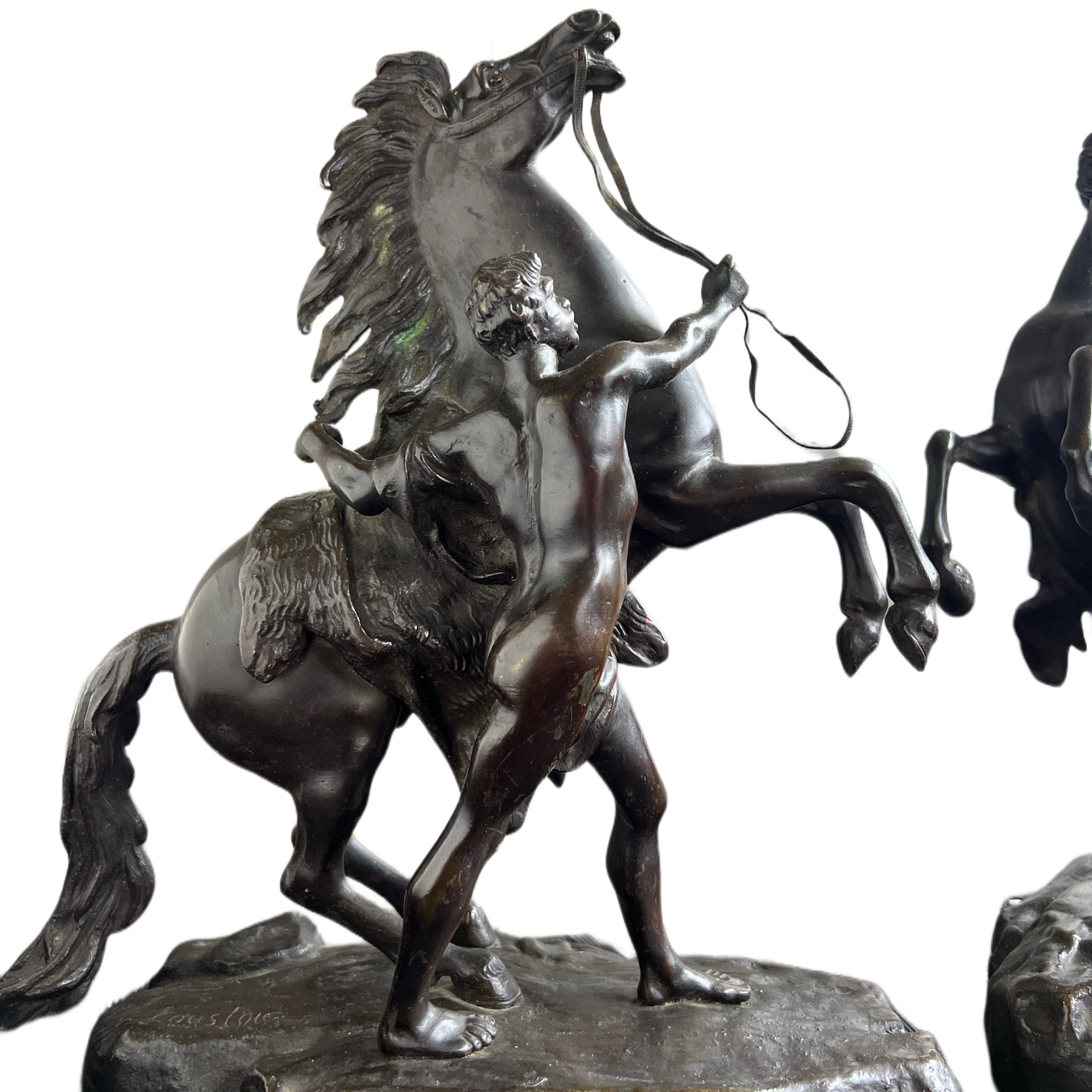 A fine pair of late 19th century bronze Marley Horses, after Guillame Cousteau (1677-1746)
